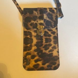 Leopard Print Phone Purse. Comes with Crossbody Strap.